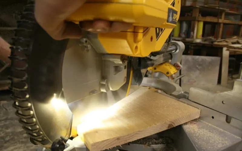 DeWalt DWS780 miter saw cutting angled