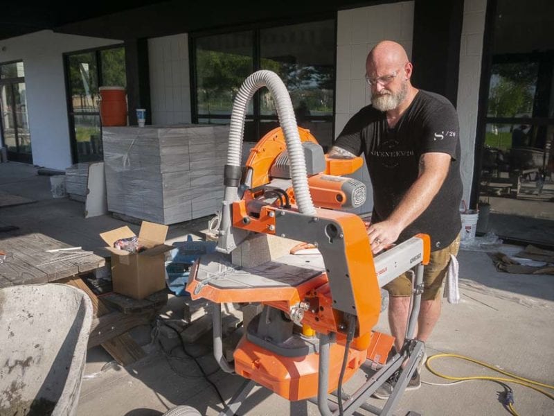 Dry Cut Masonry Saw cutting patio solid block